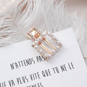 Gold hair clips with white pearls and rhinestones